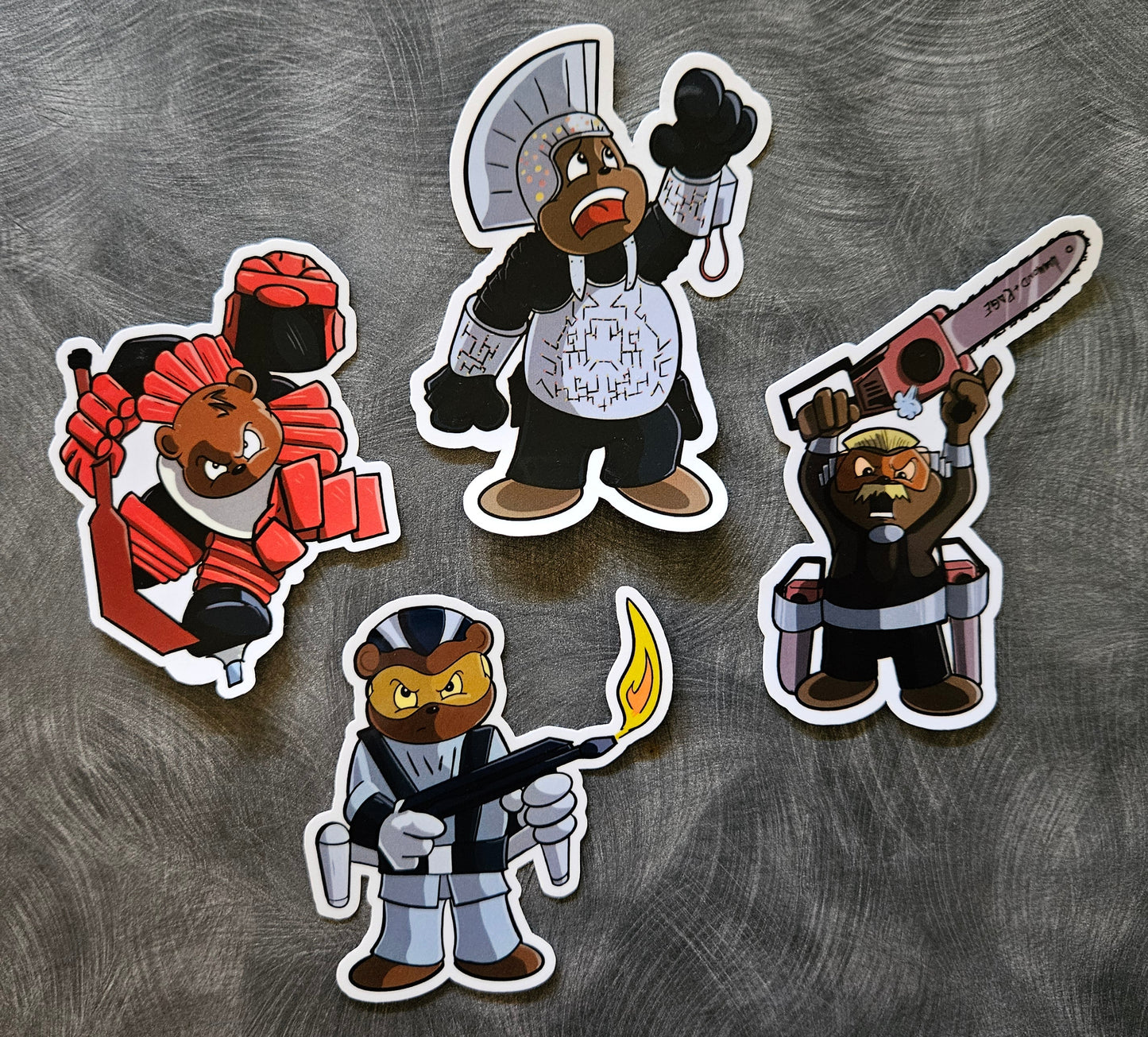 Four bear-themed stickers with different poses on a textured gray background